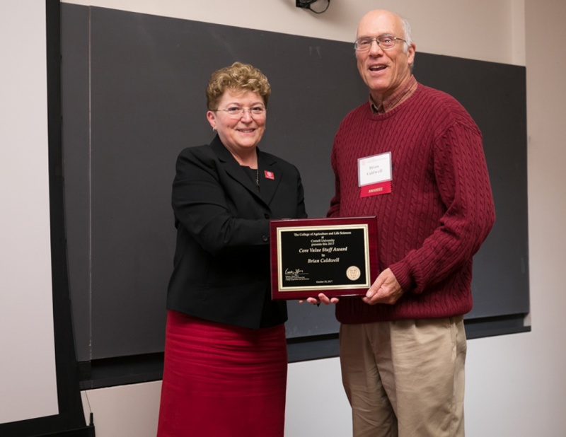 Dean Boor shakes hands with Caldwell
