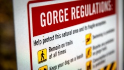 Sign listing the safety regulations for the gorges