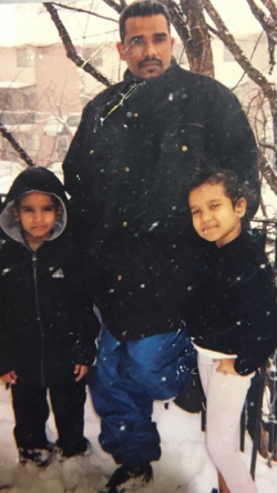 Ahmed, his father, Mukhtar, and sister, Zainab, around 2000