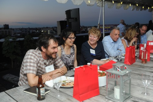 A group of people eating dinner