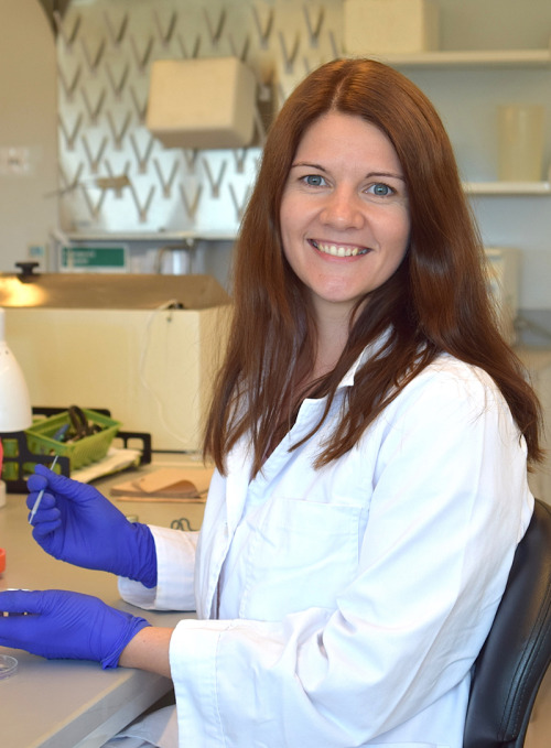 A woman working in a laboratory