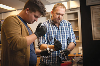 Two men work in the laboratory