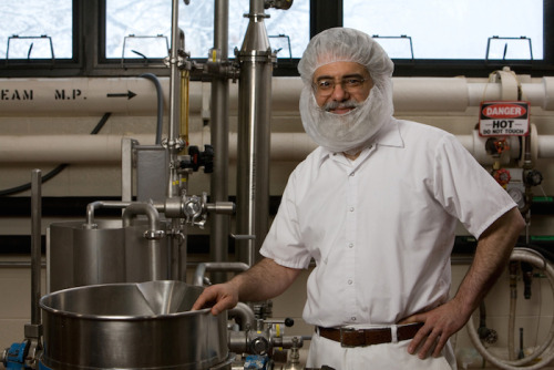 A man working in a dairy plant