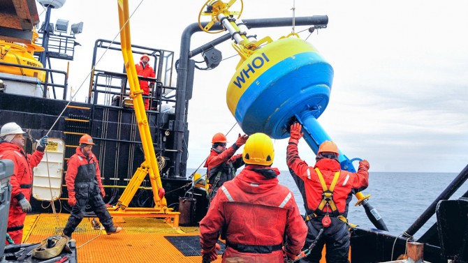 An acoustic monitoring buoy is deployed in Alaska.