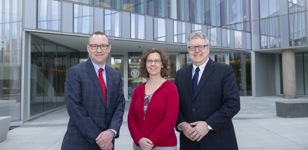 Kevin F. Hallock, Jodi Korich and Lorin D. Warnick outside the College of Veterinary Medicine