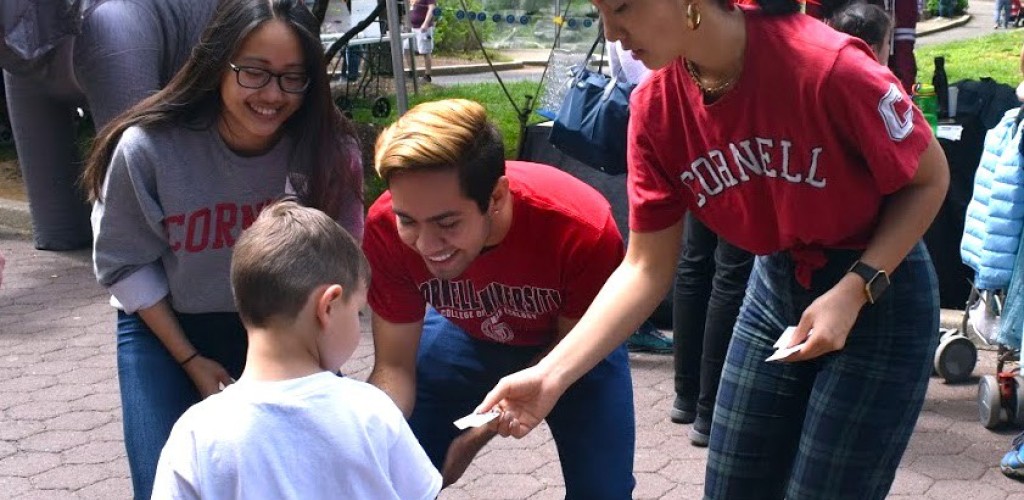 students talking to children