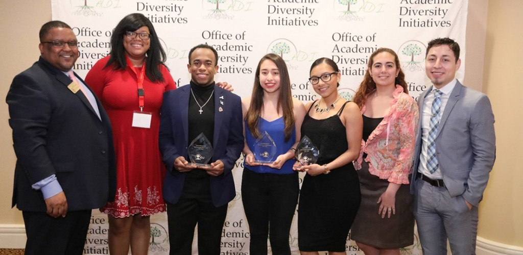 Winners pose with their awards