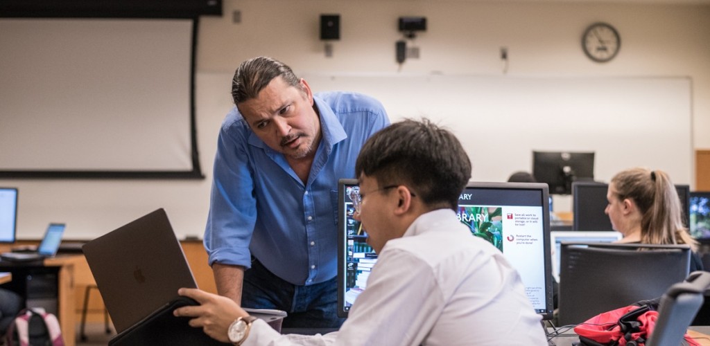 student and professor in class