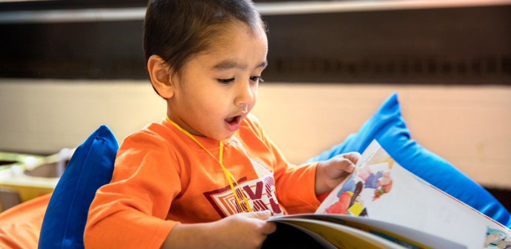 Child reads book