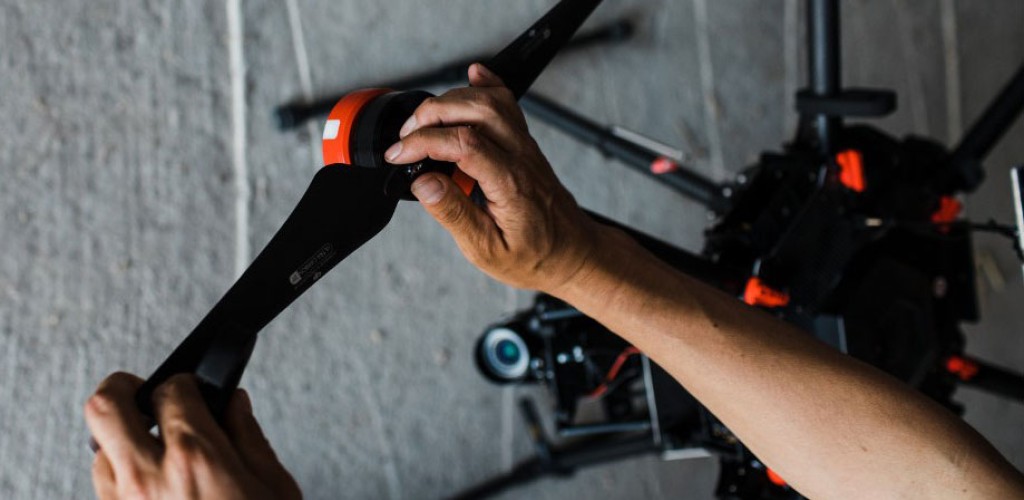 A student tinkers with a UAV