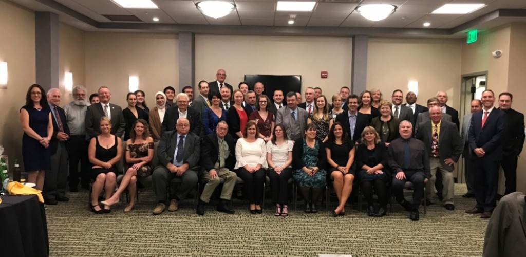 Program goers take a group photo