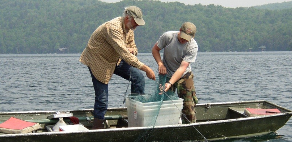 researchers haul fishing lines to collect samples
