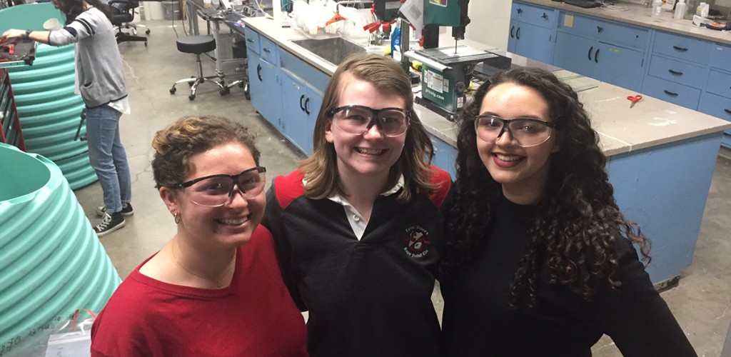 Students Zoe Maisel, Natalie Mottl, and Erica Marroquin pose in lab.