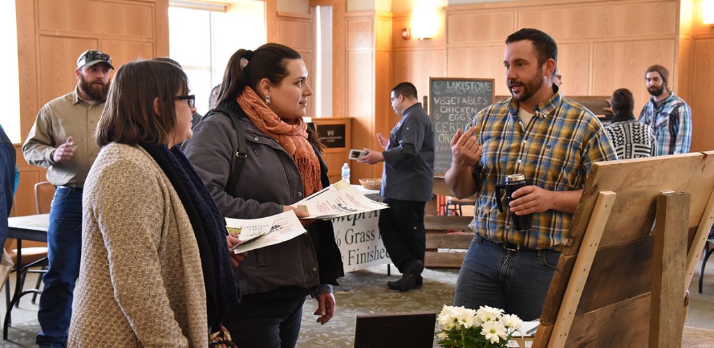 Paul Batz speaks with potential customers at the 2017 Meat & Greet Farmer and Chef Fair
