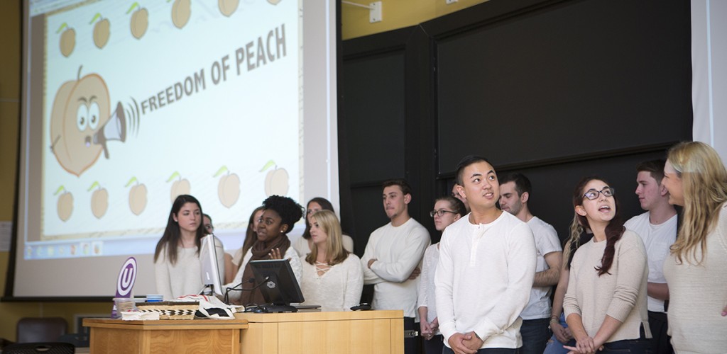 Members of the winning team give a presentation