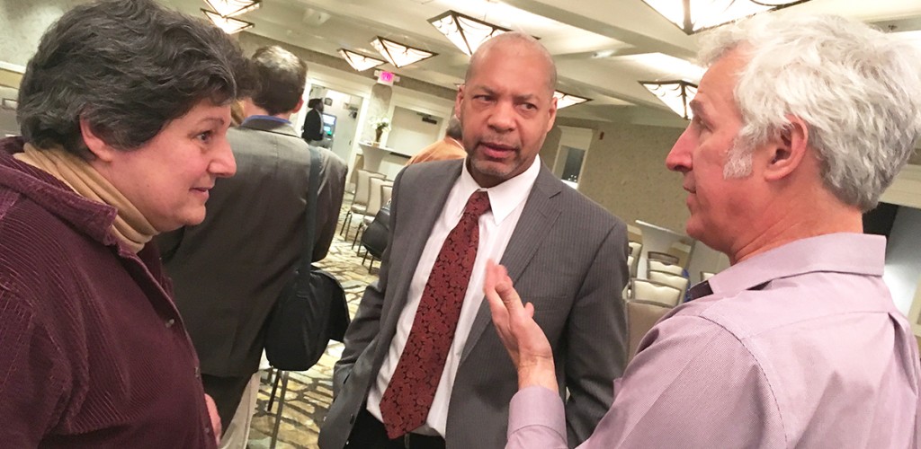 Irene Weiser, Lance Collins and Todd Cowen talking