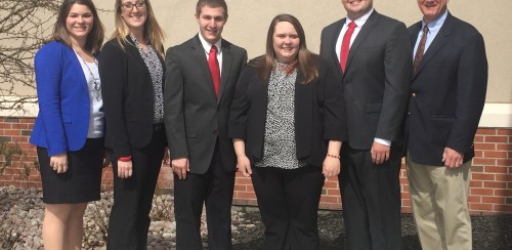 A group of people in professional clothing