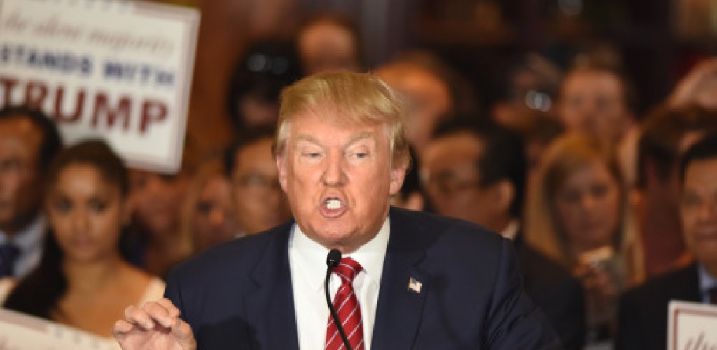 A man, Donal Trump, speaks at a podium