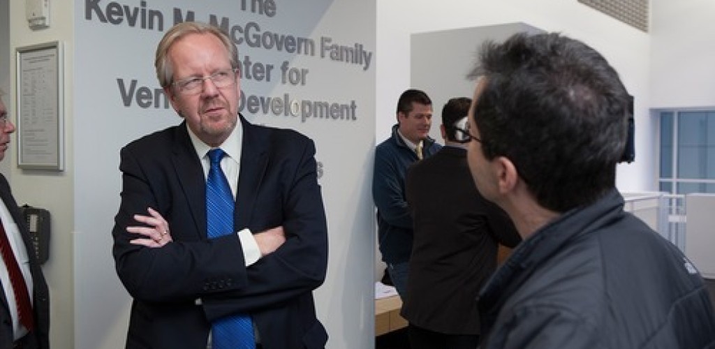 Two men speak together at the Kevin M. McGovern Family Center for Venture Development