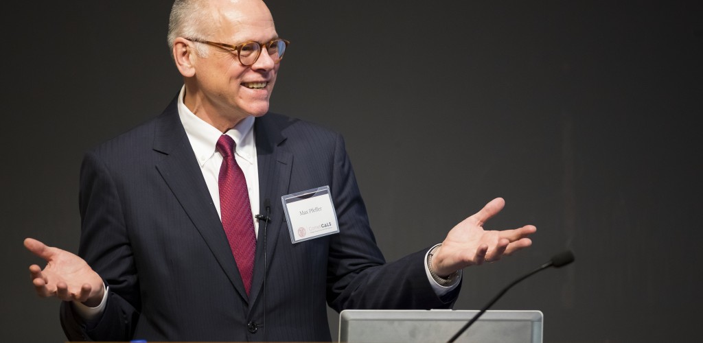 Max J. Pfeffer stands at a podium