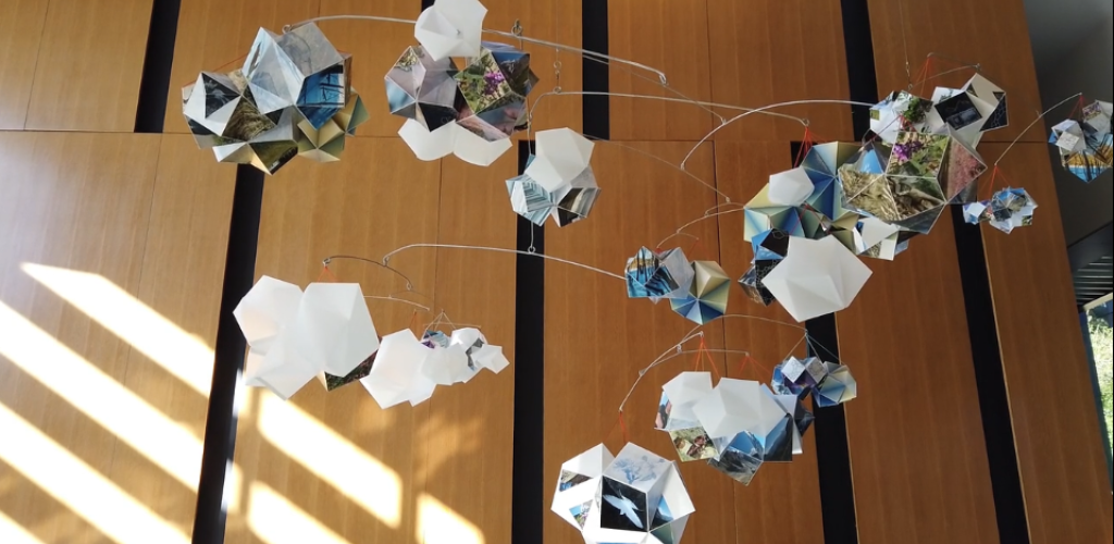 The kinetic installation of hanging sculptures 