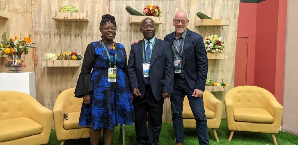 Three individuals at a television studio