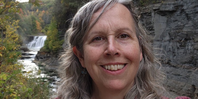 Joellen Lampman in front of a river