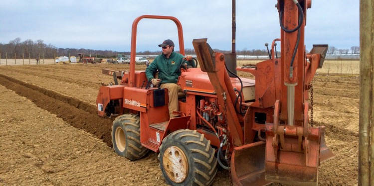 Edward Harbes IV planting a new apple orchard in 2014.