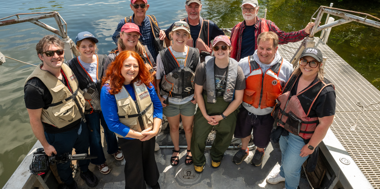 CCE staff, summer interns all wearing lifejackets - like good boaters should.