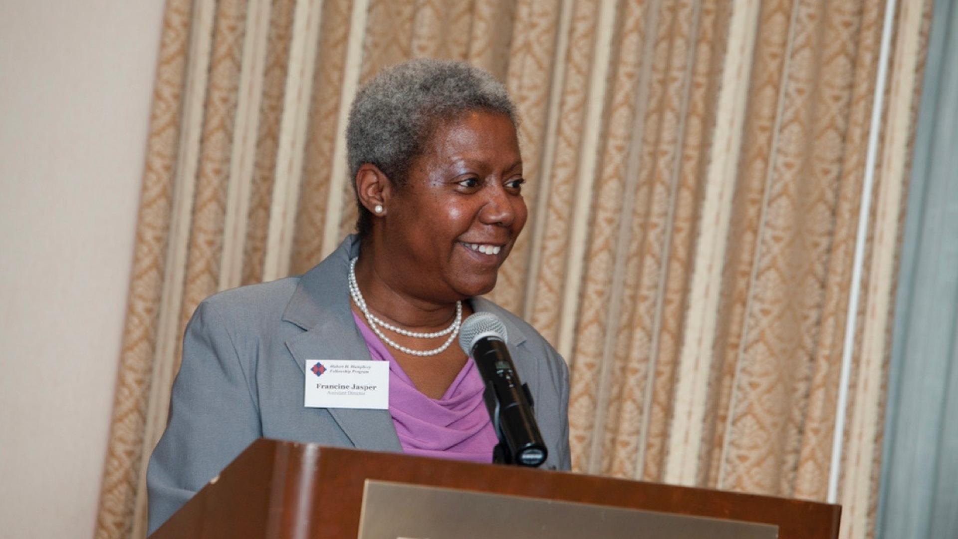 Leader speaking at podium