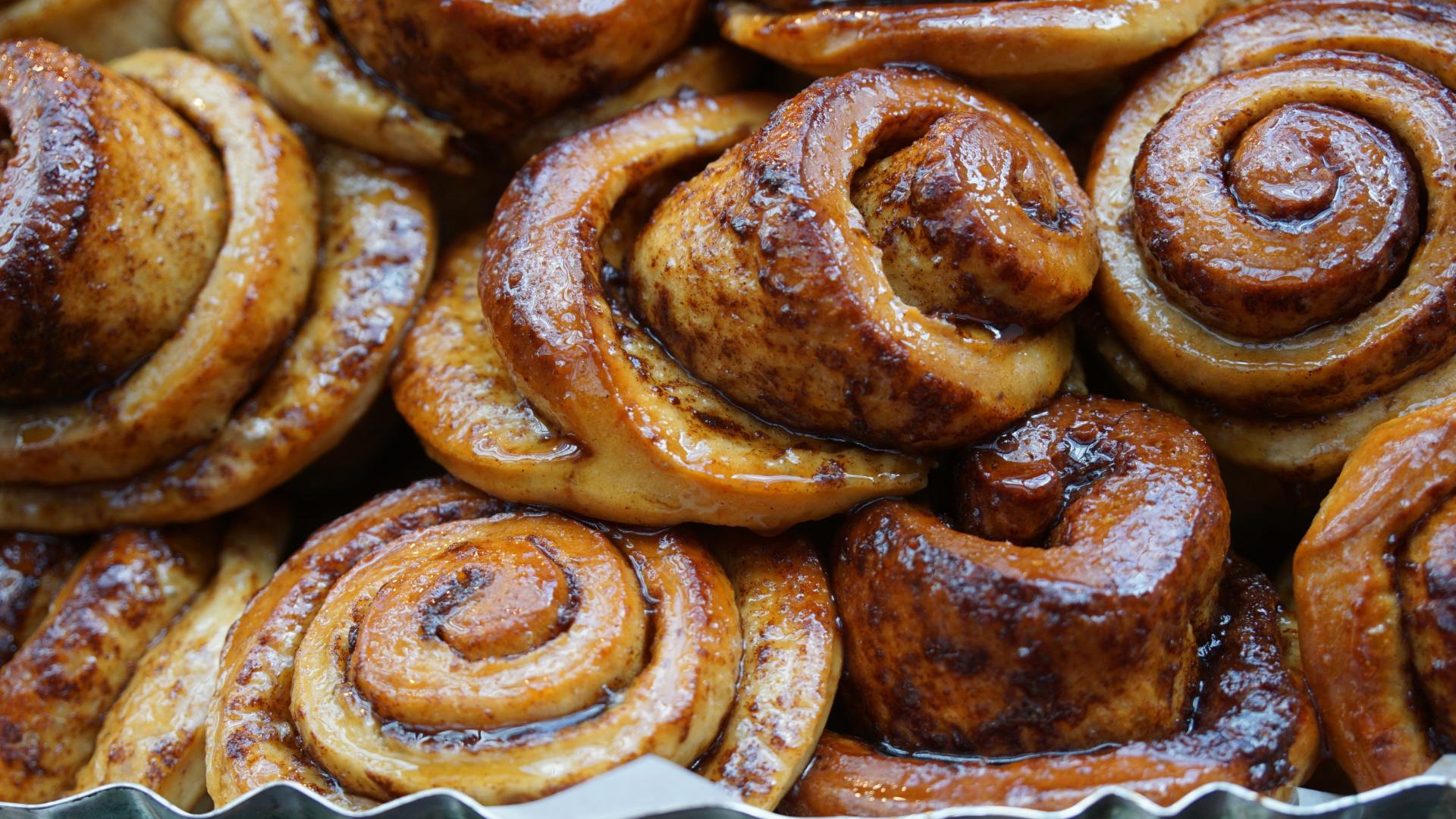 cinnamon buns in a metal tin