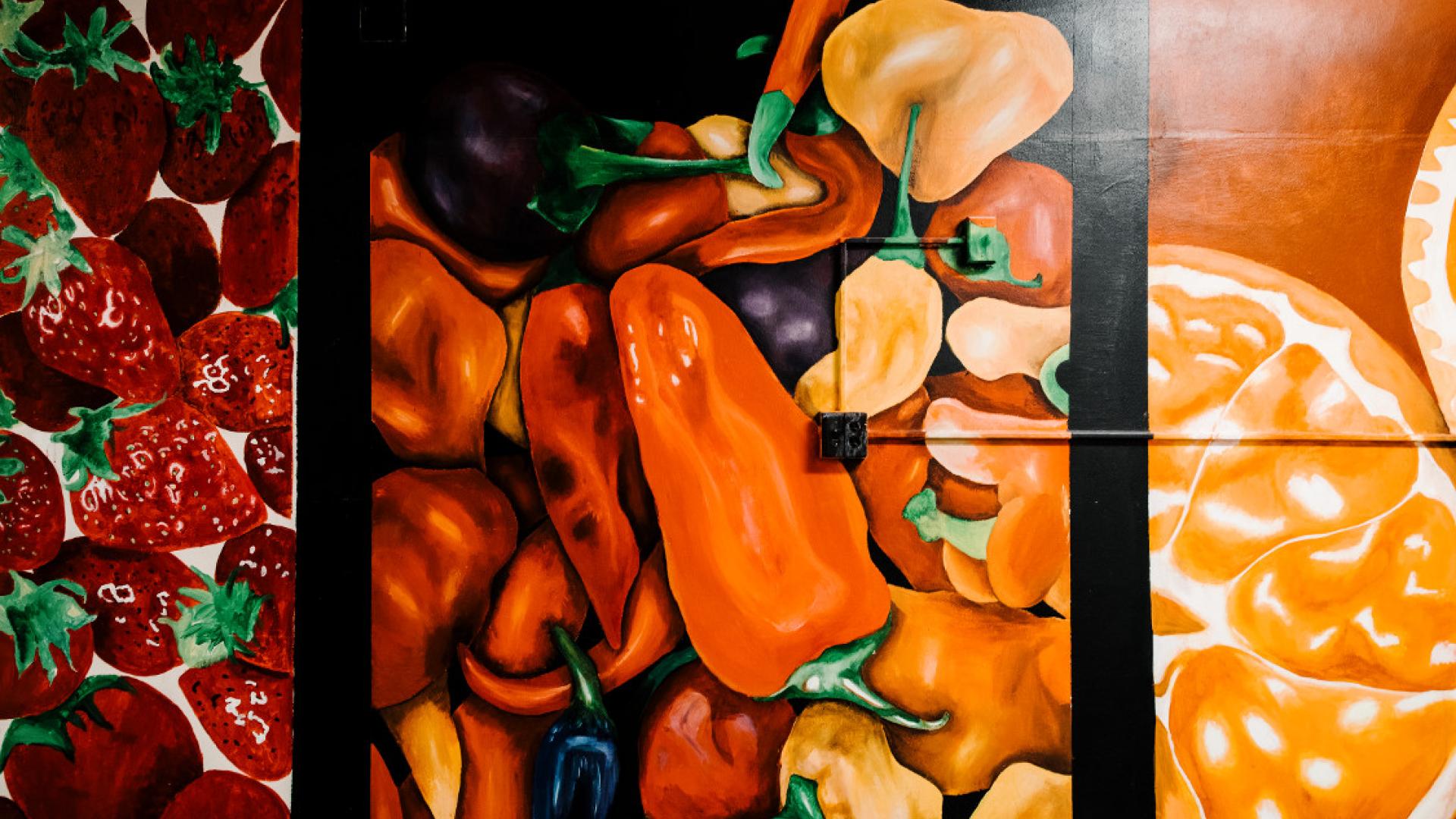 Mural painting of red and orange fruits
