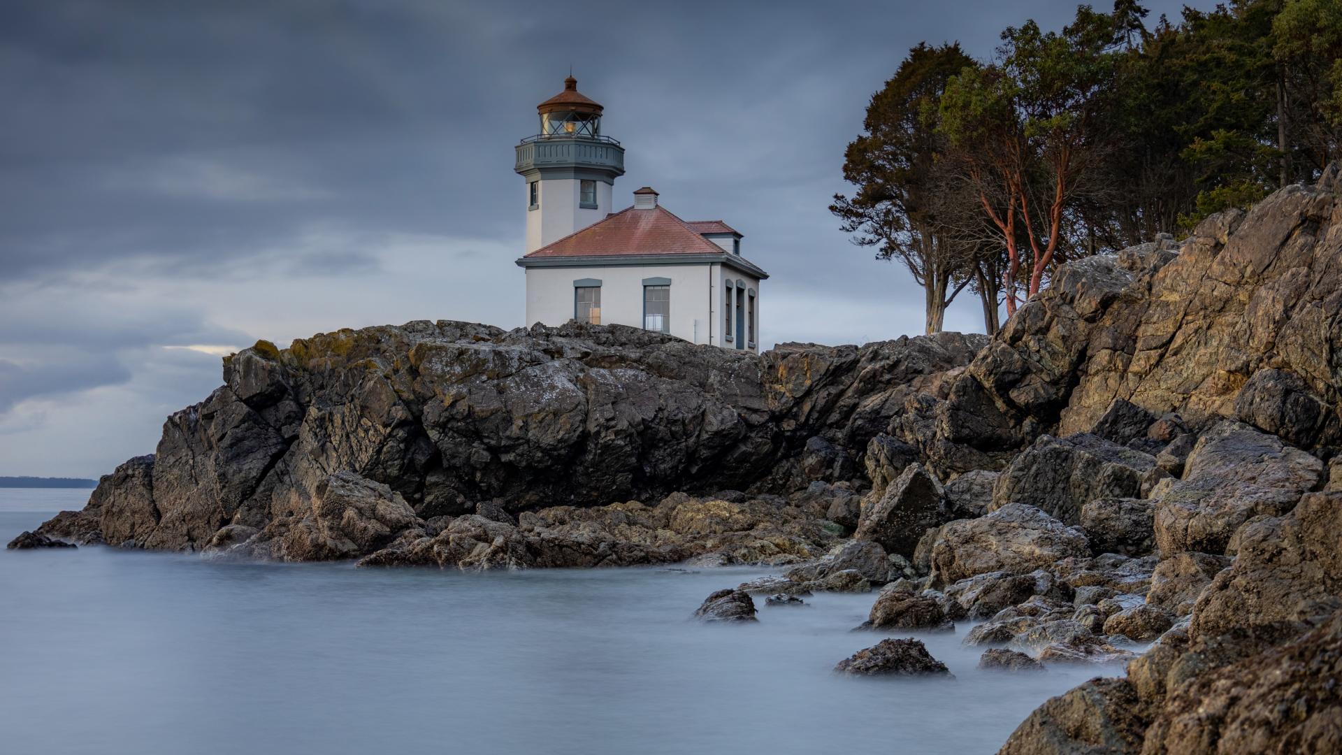 A lighthouse on ocean cliffs