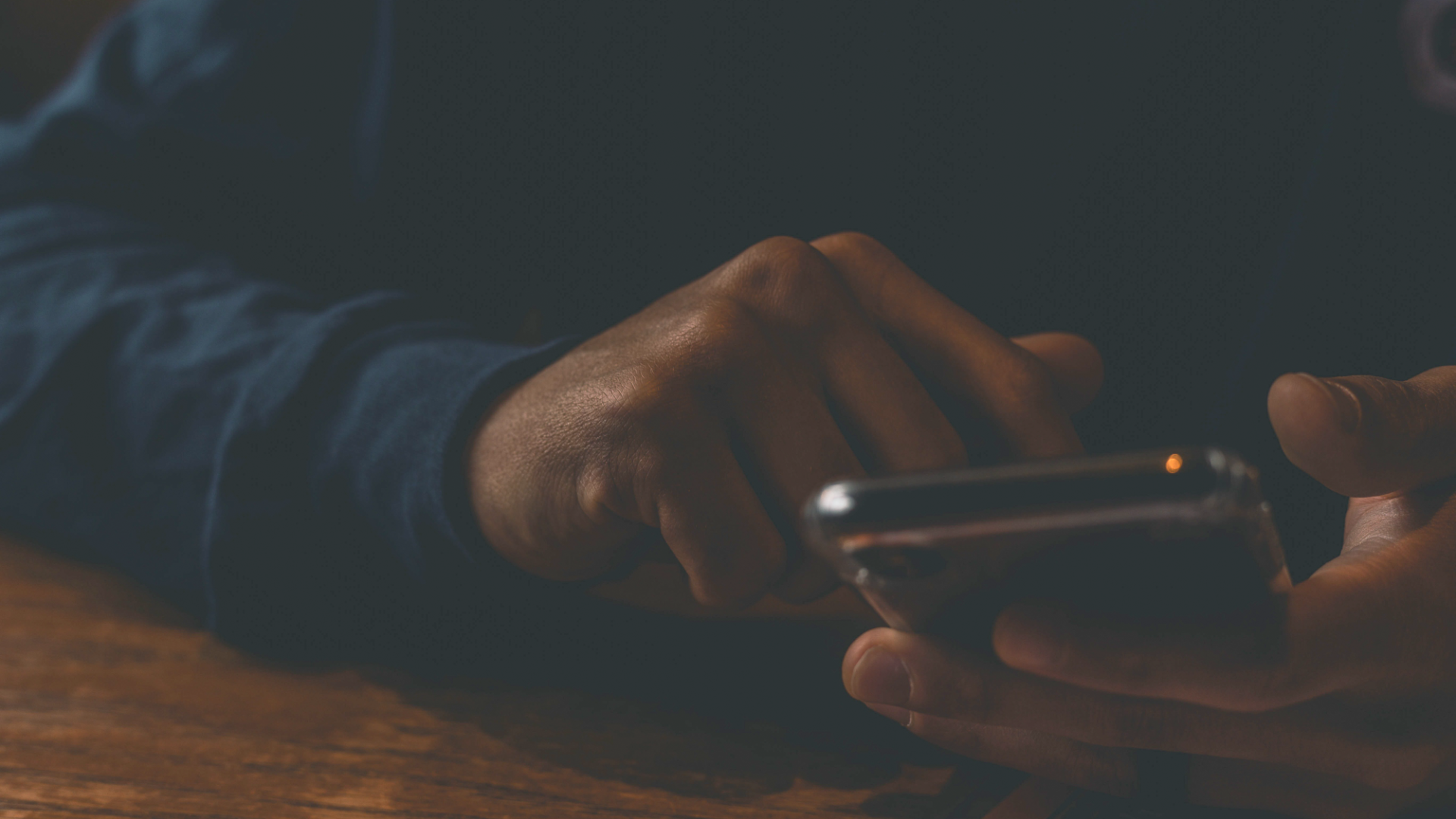 Close up shot of a hand holding a mobile phone
