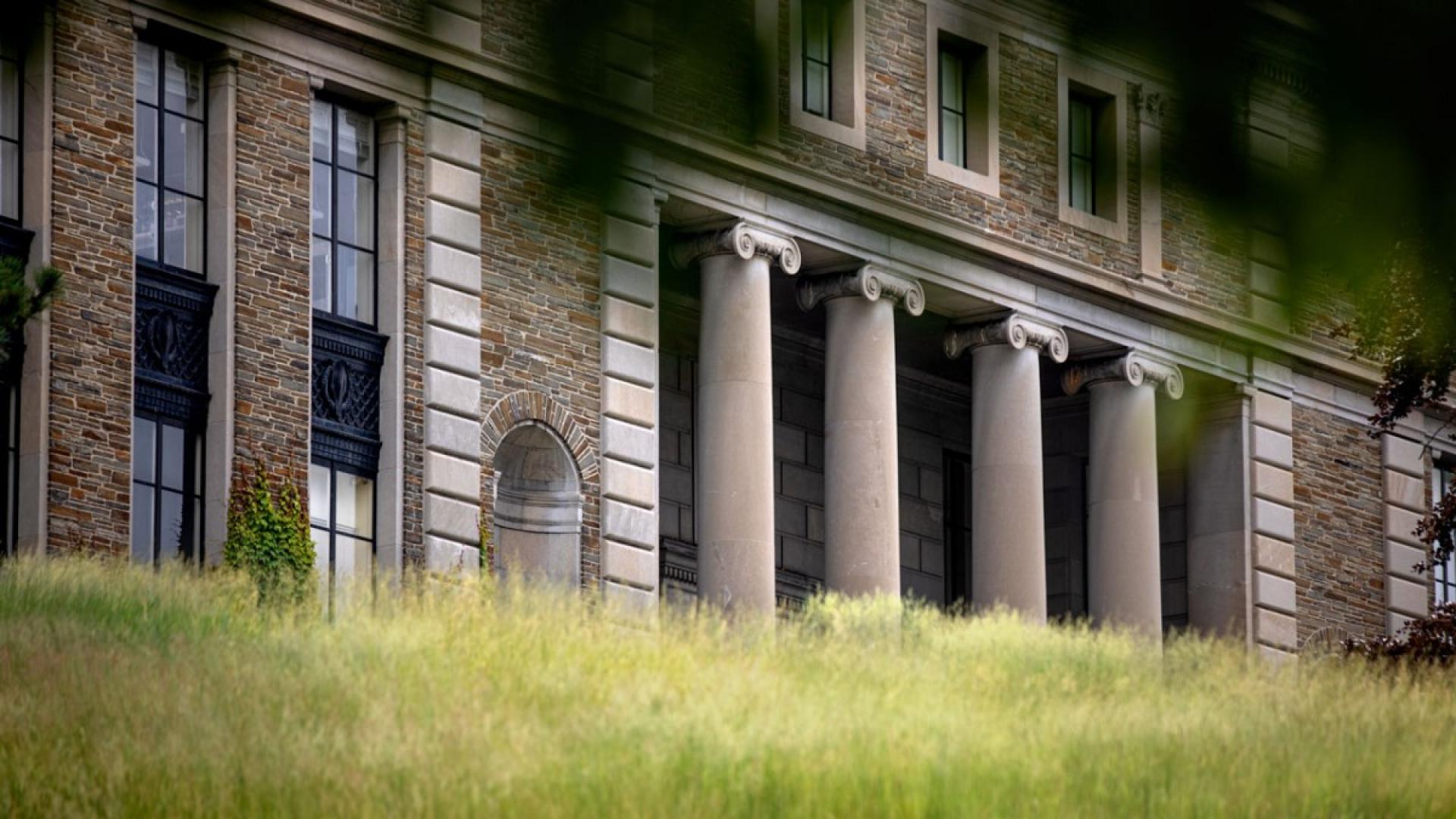 A columned building in summer
