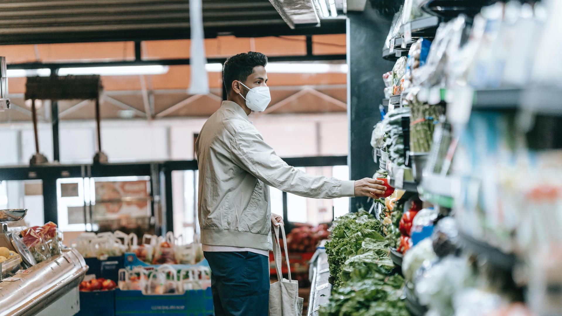 A man grocery shopping