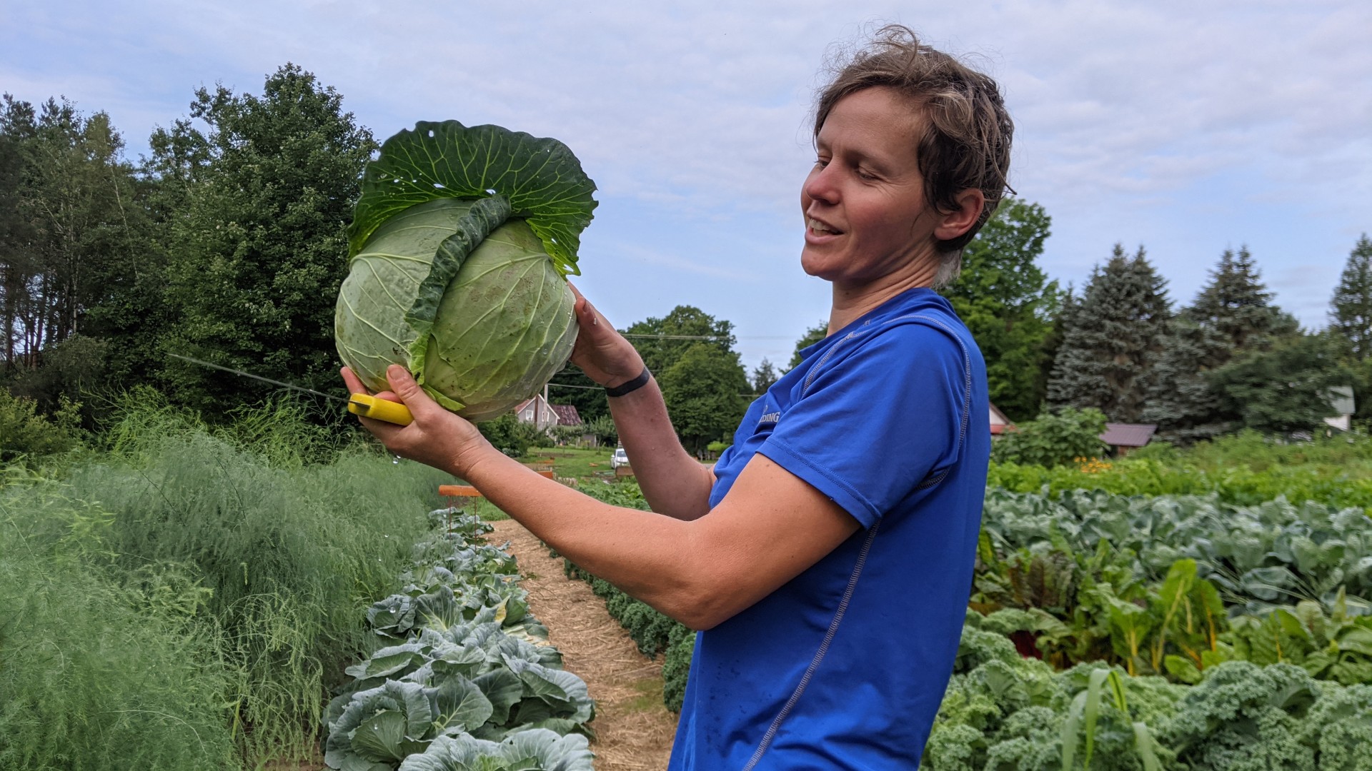 Flip Filippi proudly displaying a cabbage
