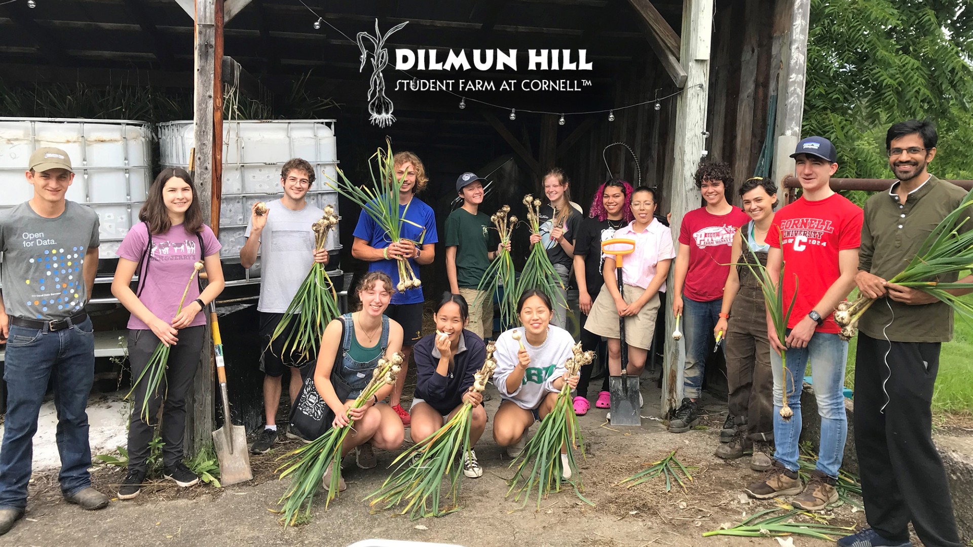 A diverse group of students with fresh garlic
