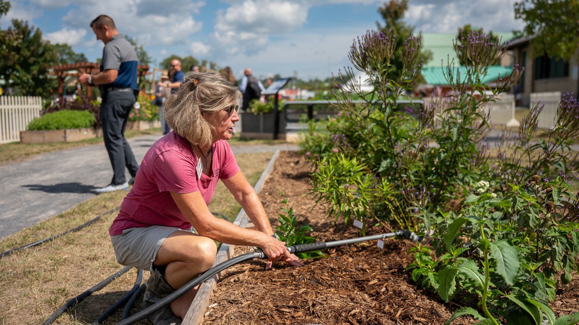 Kathys Burns in the Voice of the Farmer garden at the NY State Fair.