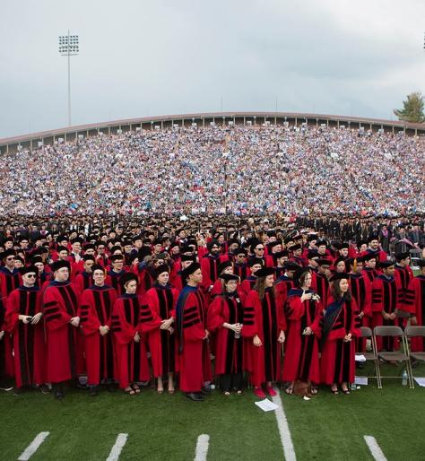 Graduating students on Cornell's Schoelkopf Field 
