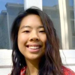 Headshot of a woman with long dark hair