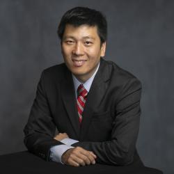 A headshot of Wendong Zhang