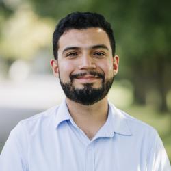 Headshot of a man outside