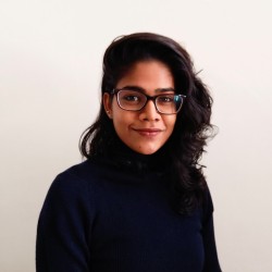 Photo of a person in front of a white background