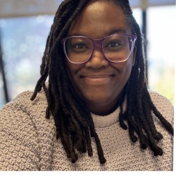 photo pf a smiling person's headshot 