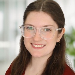 Keeley Firinne headshot, office background