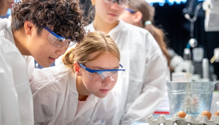 Brandon Hsieh, of New York City, and Sunny Zuger, of Washington County, participate in a lab activity session at 4-H Career Explorations June 26 in Weill Hall.