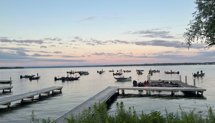 Photograph of a small marina at sunrise.