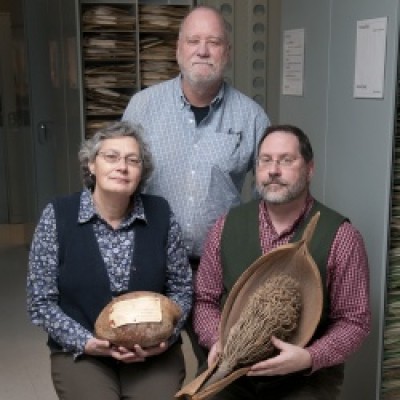 Bailey Hortorium staff showing large specimens from their collection