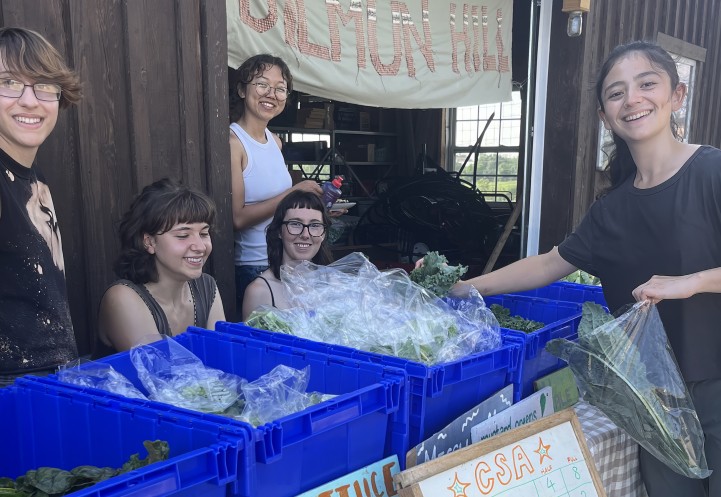 Students around bins of fresh produce